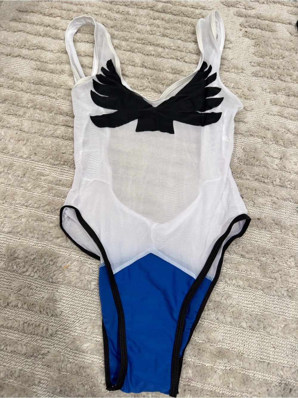 White Mesh One-Piece Swimsuit with Black Wing Applique and Blue Bottom